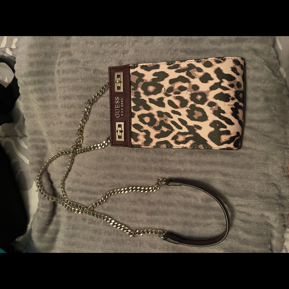 Like new! Authentic Guess cheetah phone purse